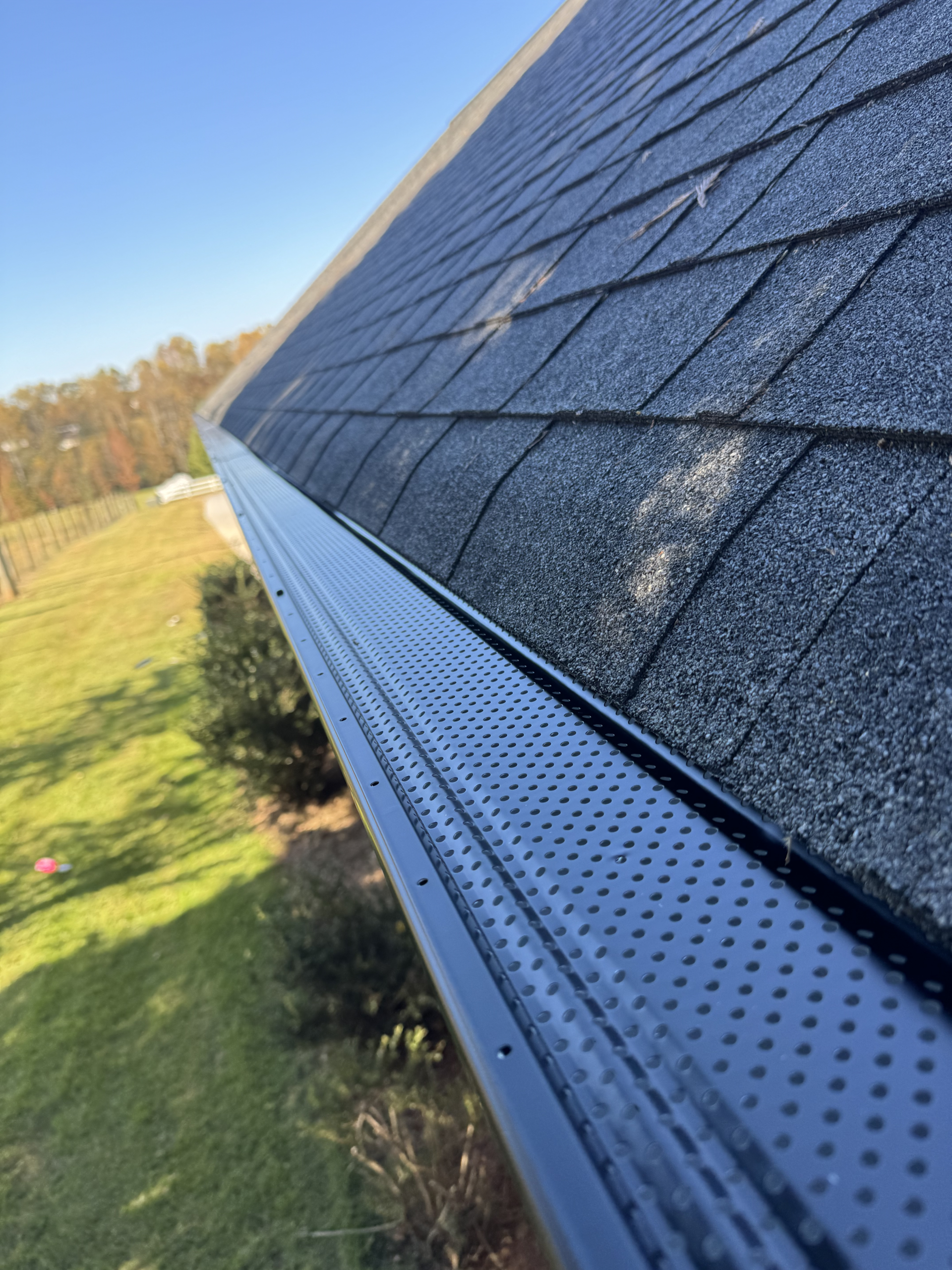 Roof gutter with a mesh guard | GutterCo (Gutter Cleaning) (Cleaning)